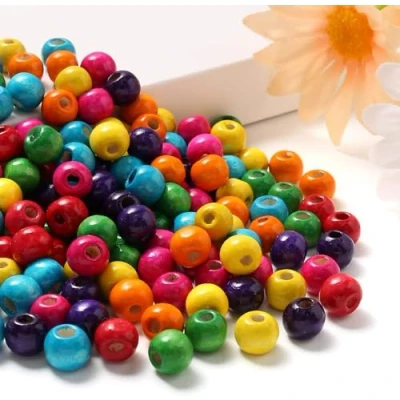 Afbeelding van HERZWILD houten kralen om te rijgen ca.600 stuks kleurrijke gekleurde knutselkralen 10mm voor DIY sieraden maken (10mm)