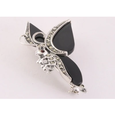 Afbeelding van Zilveren vlinder broche met marcasiet, onyx en granaat