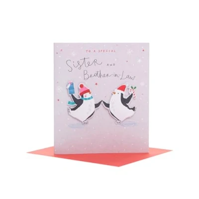 Afbeelding van UK Greetings Kerstkaart voor zuster en zwager Schaatspinguïns Design