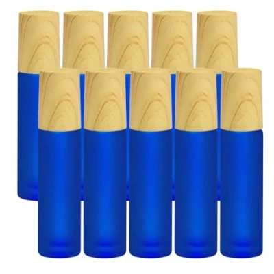 Afbeelding van Frosted glazen etherische olie roller flessen, 10 stuks donkerblauw mat glas flessen met houtnerf dop &amp; roestvrij stalen ballen olie, ml lege parfumflessen (donkerblauw)