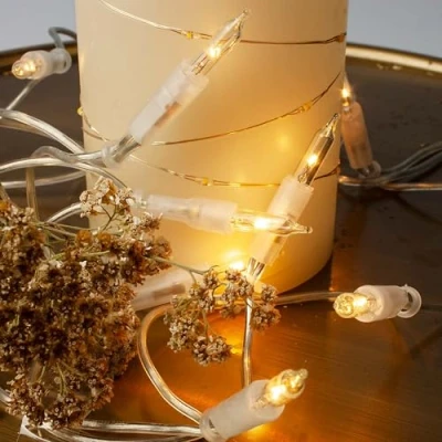 Afbeelding van hellum indoor feeënverlichting kerstboom met 10 warm witte lampjes, kerstdecoratie moderne transparante kabel stekker 1,35m, decoratie woonkamer, kerstboomverlichting,