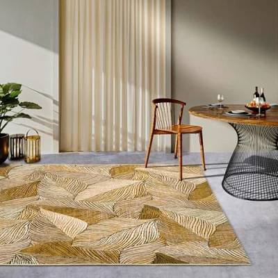 Afbeelding van Villeroy &amp; Boch Eugene Vloerkleed voor binnen en buiten, modern tapijt van plat geweven, palmbladeren, Oeko Tex, weerbestendig uv bestendig, balkon, terras, tuin, goud zwart, 120 x 180 cm