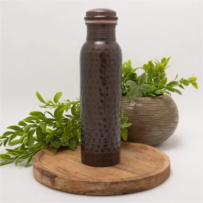 Afbeelding van Puur koperen waterfles gehamerd antique ± 950 ml (zware uitvoering)