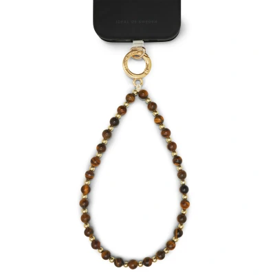 Afbeelding van iDeal of Sweden Wristlet Strap Tortoise