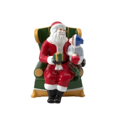 Afbeelding van Villeroy &amp; Boch Christmas Toy&#039;s Kerstman Op Stoel muziekdoosje Rood