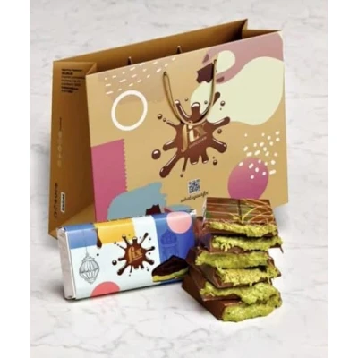 Afbeelding van Ontdek het luxe genot: Dubai Style chocolade met pistachecrème en knapperige deegdraden 200 g bord