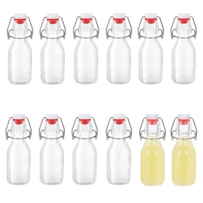 Afbeelding van Zanfqvo Glazen flessen 100 ml met beugelsluiting, 12 stuks kleine om te vullen, strijkfles sapfles voor olie, azijn, sap en limonade