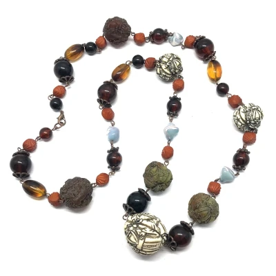 Afbeelding van Behave ketting lange kralenketting bruin buddha kralen boeddha motief 90cm