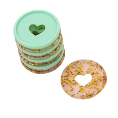 Afbeelding van Craftelier Kunststof schijfringen M met gestanst hart voor het inbinden van planners of albums Ideaal scrapbooking en andere ambachten Pack 9 stuks 35 mm diameter kleur turquoise