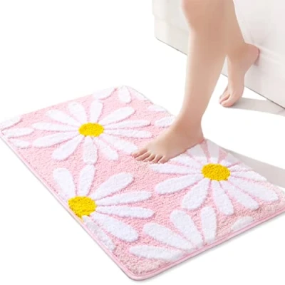 Afbeelding van QJHOMO Roze badkamertapijt, schattige madeliefjes, badmat, antislip, wasbaar, witte en gele bloem, zachte douchemat, absorberend, 40 x 60 cm