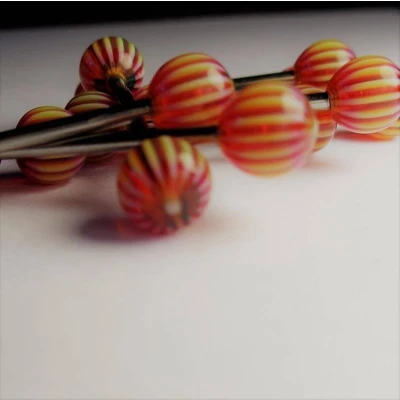 Afbeelding van Tongpiercing streepjes geel rood