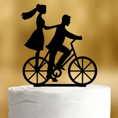 Afbeelding van Taarttopper voor de fiets, met bruidspaar, acryl, decoratie, zwart, bruidstaart, bruiloft, taartdecoratie, bruiloft