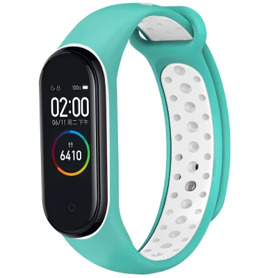 Afbeelding van Siliconen sport bandje voor de Xiaomi Mi Band 3 / 4 Mintgroen Wit iMoshion En TPU (zacht)