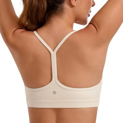 Afbeelding van CRZ Yoga Vrouwen Low Impact Strappy Gewatteerde Sport BH Y Racer Back Spaghetti Riemen Tops Witte Abrikoos L