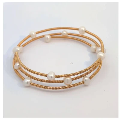 Afbeelding van Memory gouden armband met parel kralen