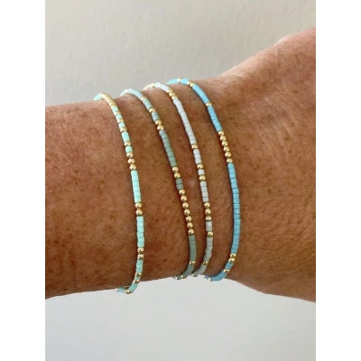 Afbeelding van Jomide Armbandjes Bohemian Blauw/Groen/Goudkleurig 4 stuks