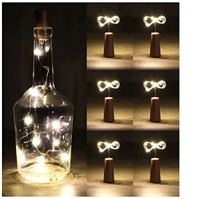 Afbeelding van COM FOUR® 6x LED flessenlicht kurkverlichting voor binnen, lege wijn en champagneflessen mini lampjes met werking op batterij (06 stuks)