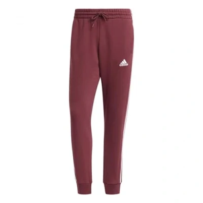 Afbeelding van adidas Sportswear Essentials Tapered CUFF 3 Stripes Pants Trainingsbroek, Heren, Maat: XXL, Shadow red