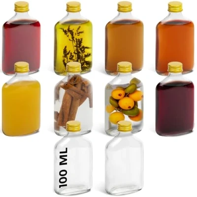 Afbeelding van HEFTMAN Fles kleine glazen flessen 12 stuks lege van 100 ml met gouden deksel luchtdichte, herbruikbare deksels, perfect voor gin, wijn, azijn, zelfgemaakte