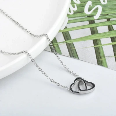 Afbeelding van Ketting met verbonden hartjes Stainless Steel gepolijst zilverkleurig Fijne damesketting hanger Valentijn