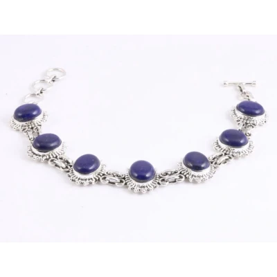 Afbeelding van Bewerkte zilveren schakelarmband met grote lapis lazuli stenen