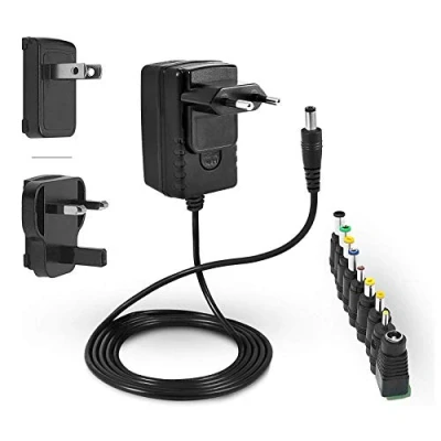 Afbeelding van LEICKE ULL voeding 12 V 2 A TÜV certificering oplader 24 W met 9 verschillende adapterkoppen voor kleine elektronische apparaten: LCD, WLAN router, hub, ledstrips, scanner, switch