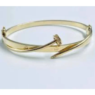 Afbeelding van Goudkleurige RVS Armband Luxe Design met Spijkerlook &amp; Zirkonia Steentjes Unisex Modieuze Sieraad Cadeau