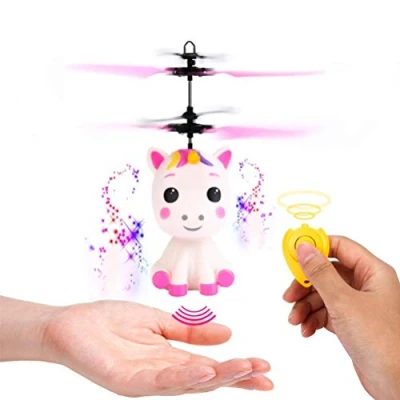 Afbeelding van Guanan Mini Flyer eenhoorn met afstandsbediening en USB kabel, vliegende led lichteffect propeller, handbediend, kinderen, meisjes vanaf 6 jaar