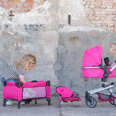Afbeelding van Bandits and Angels poppenwagen Pink Angel 4in1 megapack wandelwagen, buggy, bedje en wippertje 3 jaar zwenkwielen roze