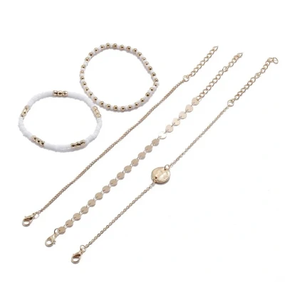 Afbeelding van Jomide Armbandjes Set Bohemian Wit/Goudkleurig 5 delig