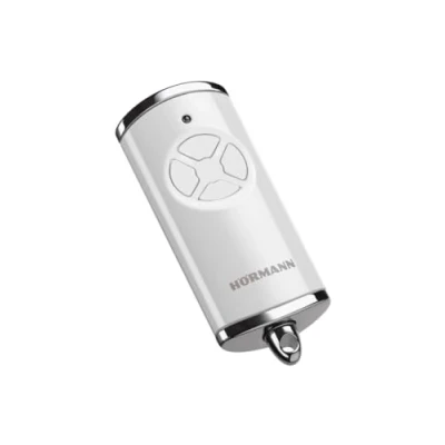 Afbeelding van Hörmann Handzender HSE 4 BS (frequentie 868 MHz, hoogglans wit, garagedeuraandrijving met chromen doppen, batterijen, afmetingen 28x70x14 mm, incl. sleutelring) 4511565